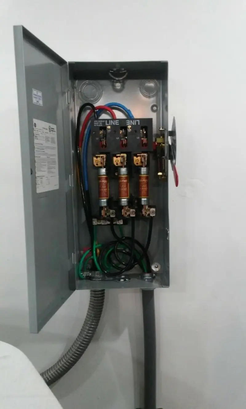 Three-phase disconnect switch installed for Smoke Detector Installation in St. Martin